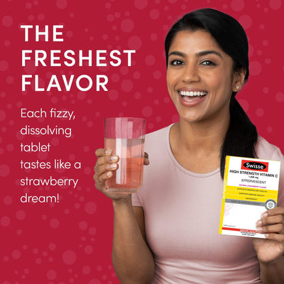 Woman holding a glass of pink drink and Swisse vitamin supplement on a red background